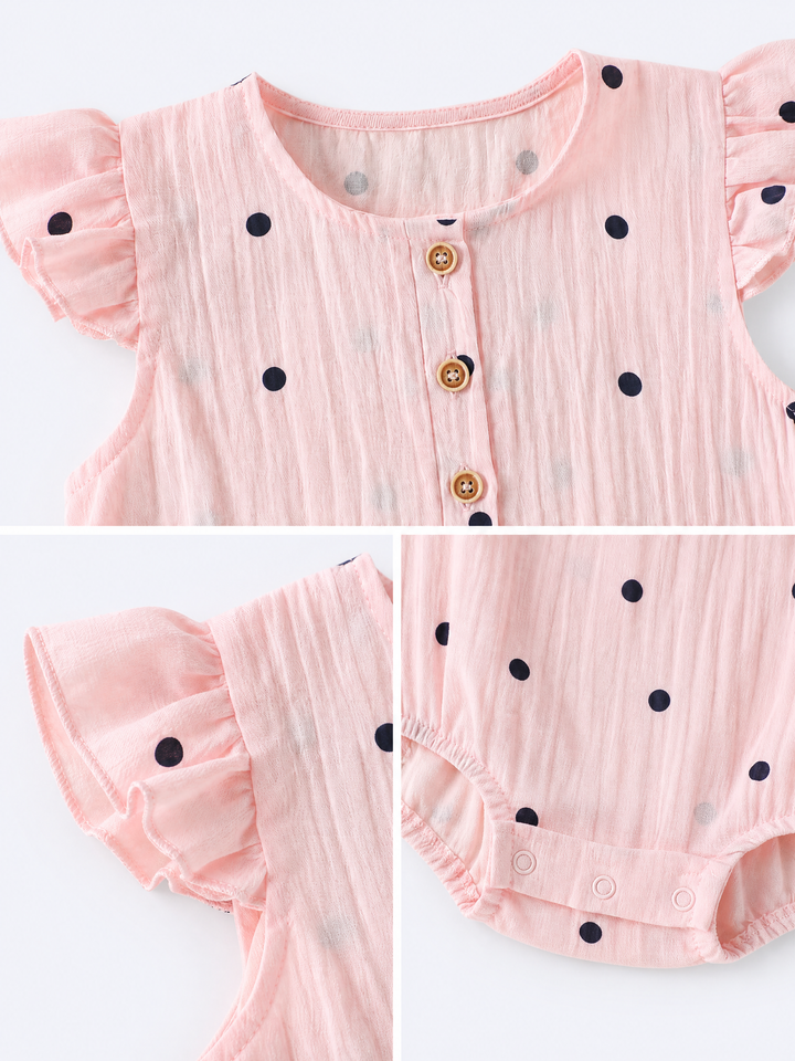 Close-up details of blush pink baby polka dot ruffle sleeve bodysuit with front buttons and snap closures