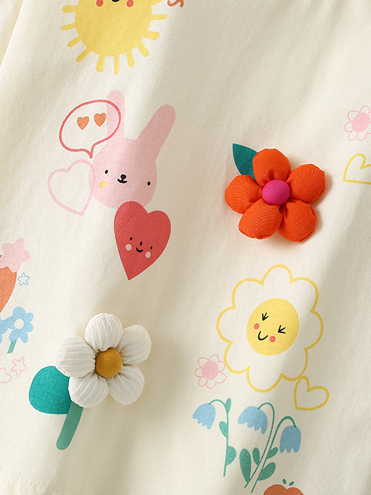Close-up of flower, bunny and dimensional floral details on the Girls’ Sunshine Garden T-shirt