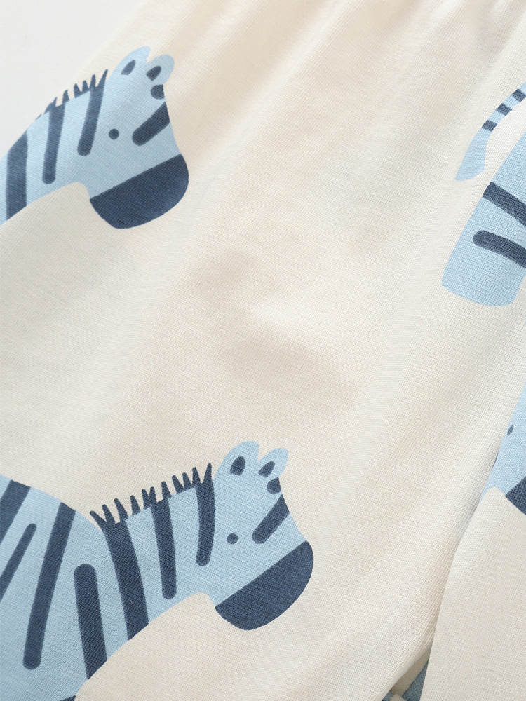 Close-up of blue zebra print on Boys’ soft cotton pajama set