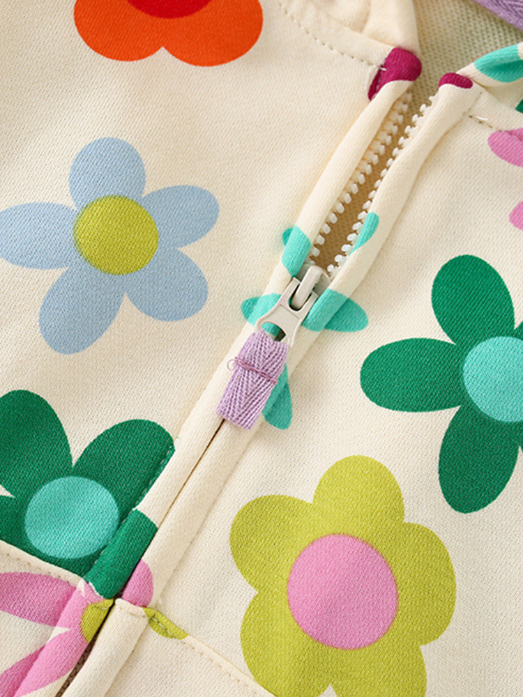 Close-up of colorful flower print and lilac zipper pull on Girls’ cotton hooded jacket
